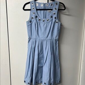 Calvin Klein sleeveless powder blue dress with metal grommets.